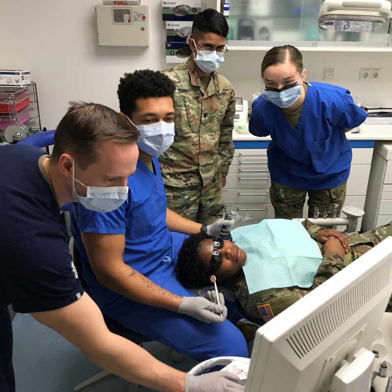 Enlisted dental assistant Soldiers training on the latest digital dentistry technology. (U.S. Army photo by Kirk Frady)